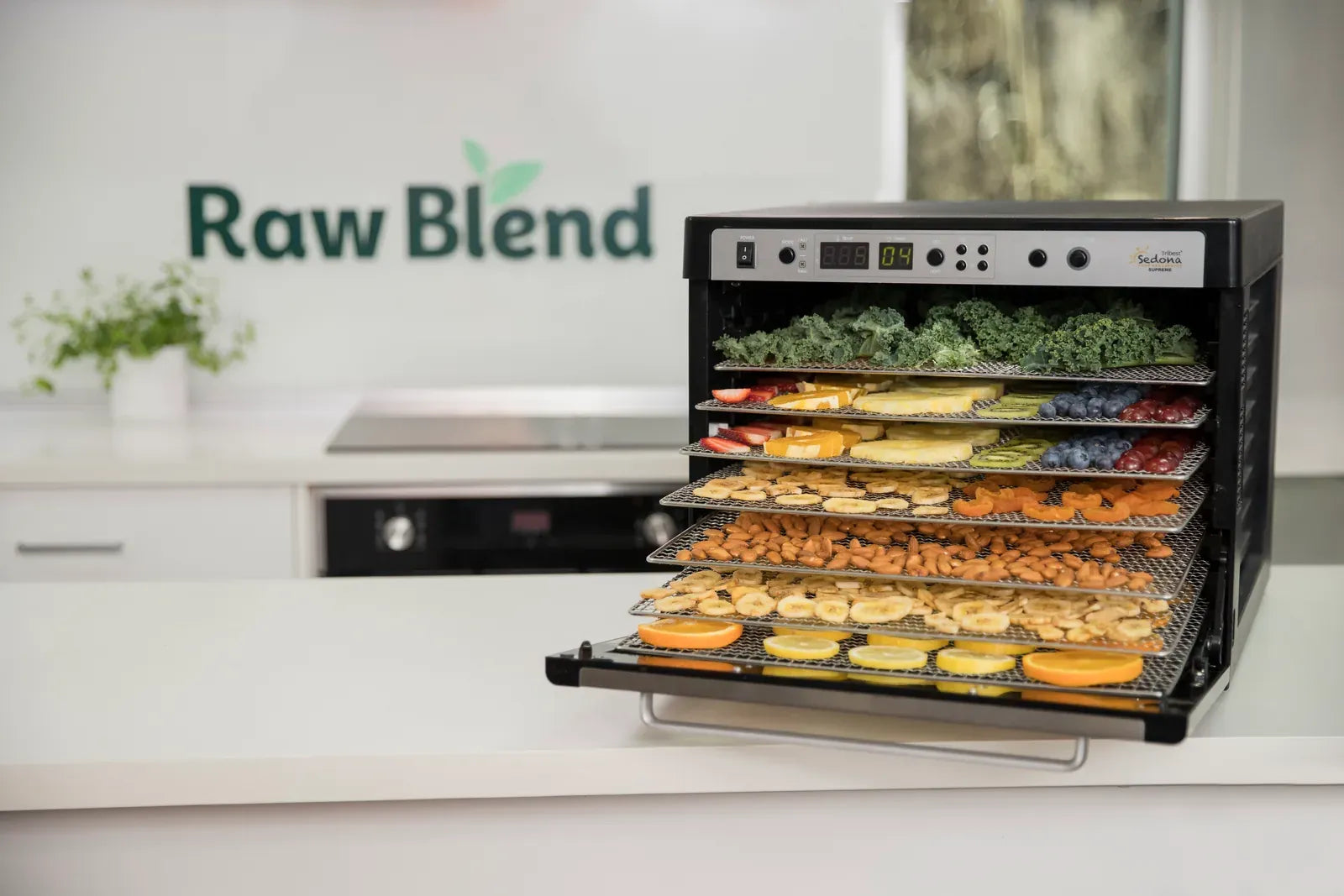 A Sedona dehydrator with rainbow trays of dried fruit