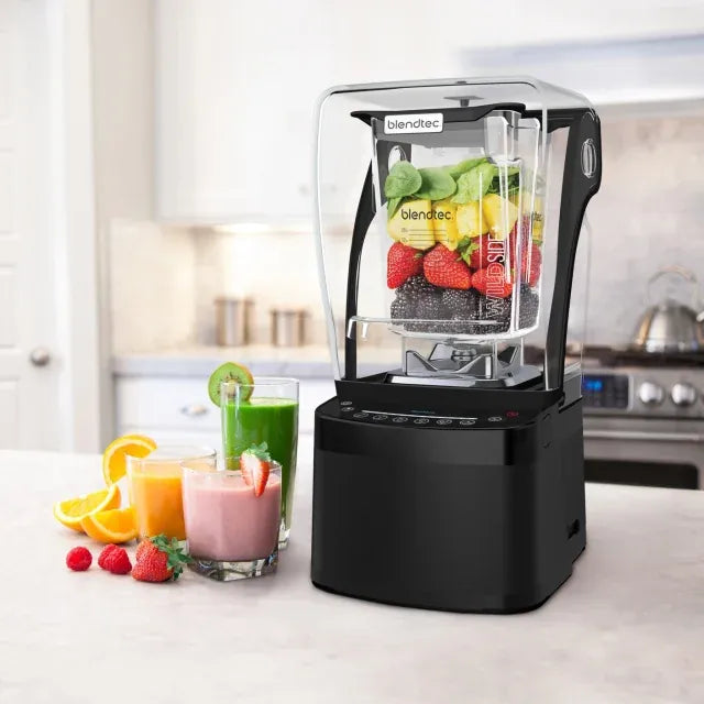 A Blendtec blender surrounded by fruit smoothies